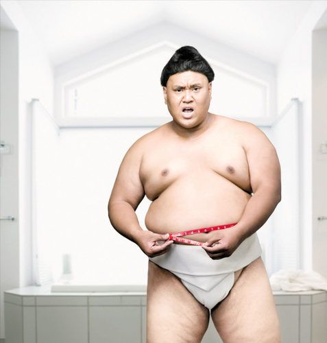 胖子工资低两成